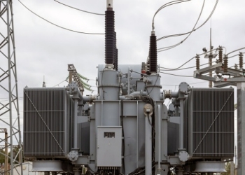 High temperatures continue, and power grid employees take a shower to cool down transformers